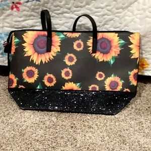 I am selling a sunflower purse